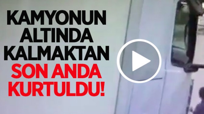 Kamyonun altında kalmaktan son anda kurtuldu